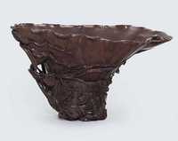 18TH CENTURY A RHINOCEROS HORN LIBATION CUP